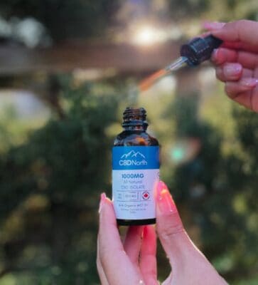 a hand showing cbd north cbd oil