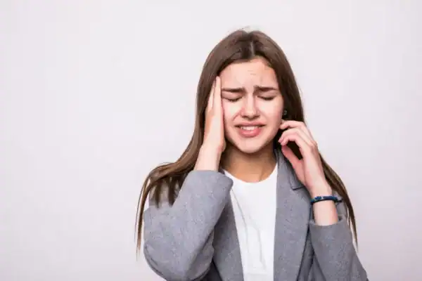 female stressed out due to tinnitus