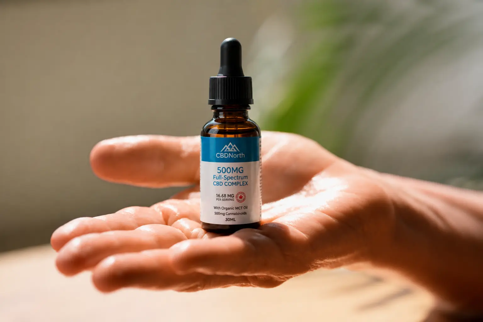 broad spectrum CBD oil on hand visuals